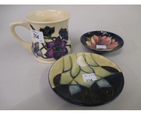 Moorcroft ' Open Weekend, 24th May, 1998 ' floral decorated mug inscribed M.C.C. 1998, together with two small Moorcroft flor