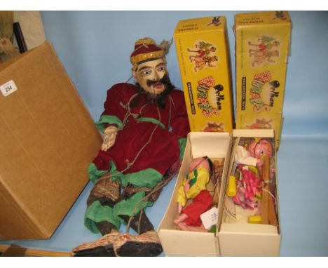 Large wooden puppet together with two Pelham puppets