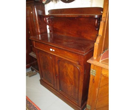 Early 19th Century mahogany chiffonier with shelf back above single drawer and two arched panel doors on a plinth base