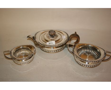 Late 19th Century silver tea service of circular half fluted design, London, 1891