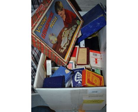 Box containing a large quantity of assorted playing cards, games and assorted cards