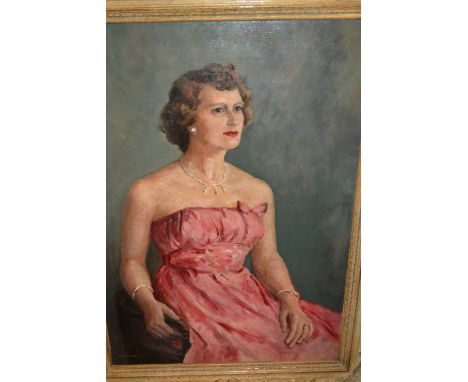 20th Century oil on canvas, half length portrait of a seated lady, signed T.M. Jarvis in a painted swept frame, 25ins x 17ins