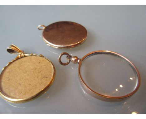 9ct Gold locket together with two other portrait lockets