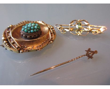 Edwardian yellow metal brooch set peridot, small Masonic stick pin and a Victorian turquoise set mourning brooch