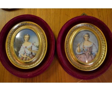 Pair of 20th Century oval gilt and plush framed portrait miniatures
