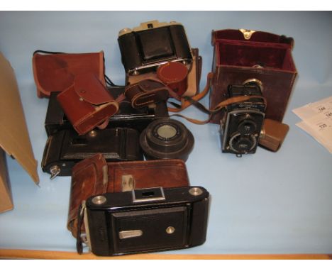 Rolleiflex twin lens camera in original case together with various other vintage bellows cameras and 35mm cameras