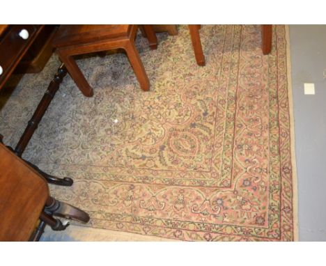 Turkish Persian pattern medallion and floral design carpet (faded), approximately 10ft x 7ft