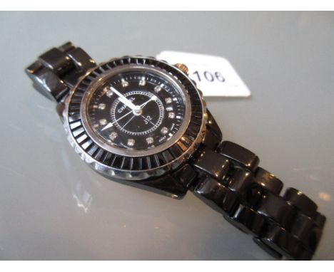 Chanel J. 12 midi size ceramic and stainless steel quartz wristwatch, the black dial with diamond set batons