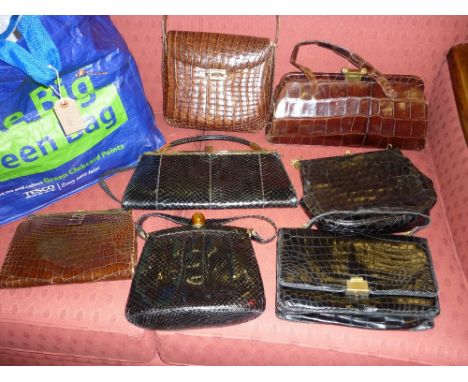 Group of six various black and brown vintage simulated crocodile skin leather handbags