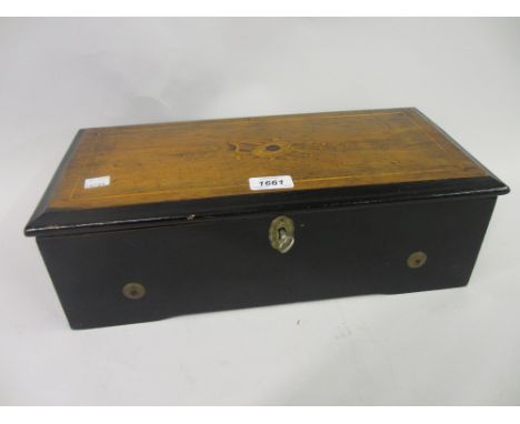 19th Century ebonised and inlaid cased music box with movement (comb missing many teeth)