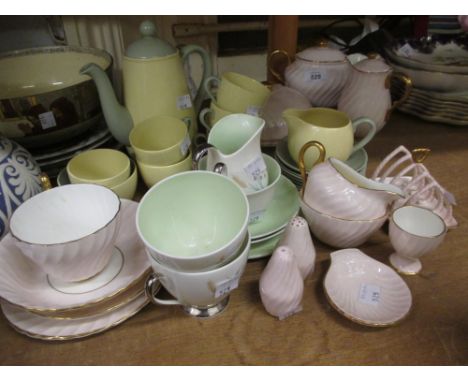 Foley breakfast set decorated in pink and gilt, together with a Spode Art Deco coffee set in pale blue and yellow and a Queen