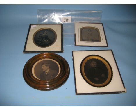 Three various Victorian portrait photographs together with a later circular mounted photograph
