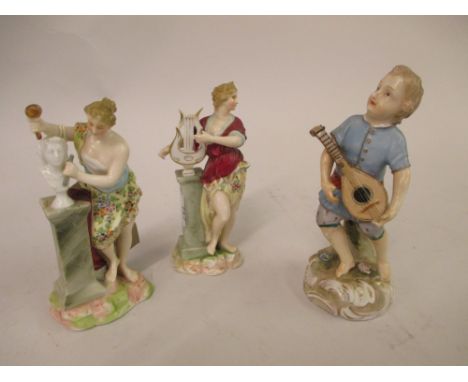 Pair of Continental porcelain figures depicting the arts, together with a Continental porcelain figure of a boy playing a man