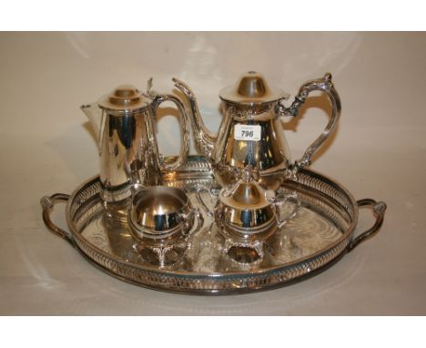 Silver plated tea service on an oval plated tray together with a large quantity of other miscellaneous silver plate