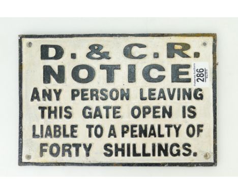 A large cast metal railway gate sign: Marked D &amp; C. R. 
