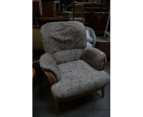 Armchair: Ercol Windsor honey elm armchair 