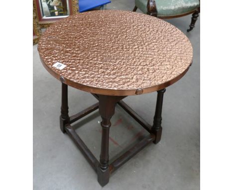 Vintage Pub table: Hand beaten circular copper top on a oak stretcher base (67cm tall x 60cm diameter)