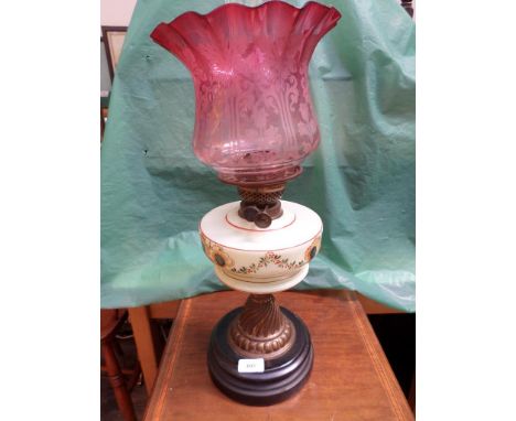 Fine Victorian oil lamp on brass and circular black marble base, clouded glass painted bowl with etched cranberry glass shade