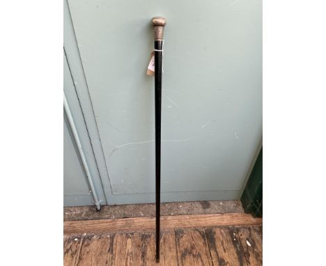 Ebony late Victorian walking cane with silver handle and collar  