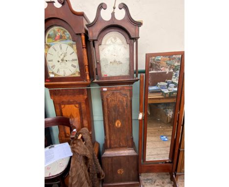 Long cased clock in mixed woods with swan neck pediment and brass finial, hand painted enamel dial with second hand and date 