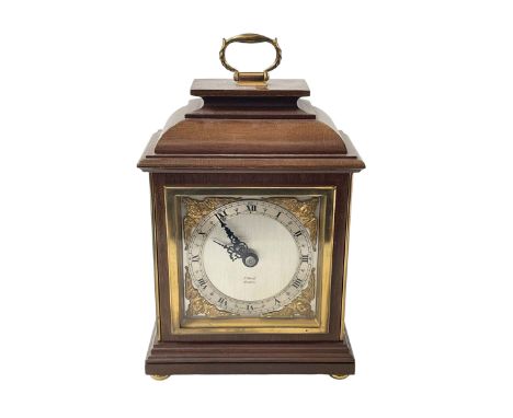 Elliott mantel clock on brass bun feet, 23cm to top of handle.