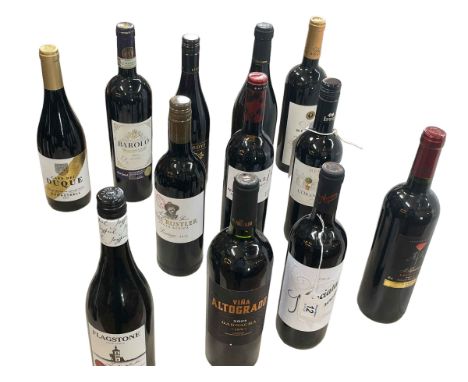 Twelve bottles of red wine including Barolo, Primitivo, Flagstone Longitude and Pecorino.