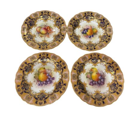 Set of four Royal Worcester fruit decorated plates, each signed E Phillips, 22.5cm.