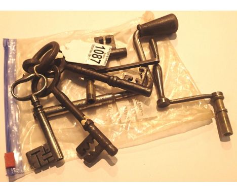 Three large cranked clock keys and four large antique keys. P&amp;P Group 1 (£14+VAT for the first lot and £1+VAT for subsequ