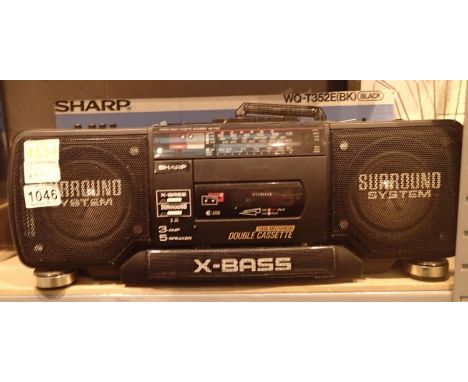 Sharp x-bass radio and twin cassette player. Not available for in-house P&P, contact Paul O'Hea at Mailboxes on 01925 659133C