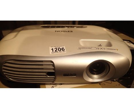 Epson projector with spare lamp, model EMP PW10. Not available for in-house P&amp;P, contact Paul O'Hea at Mailboxes on 01925