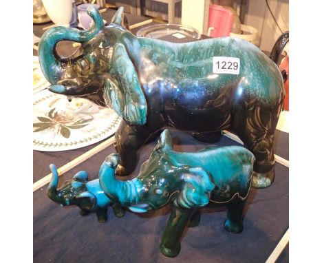 Three blue mountain type ceramic elephants. Not available for in-house P&amp;P, contact Paul O'Hea at Mailboxes on 01925 6591