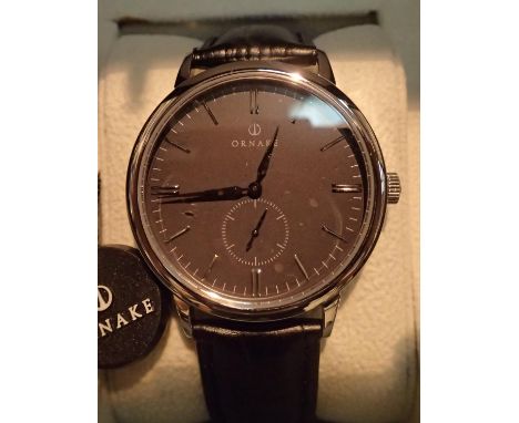 Ornake gents wristwatch with black face in a full presentation box. P&amp;P Group 1 (£14+VAT for the first lot and £1+VAT for