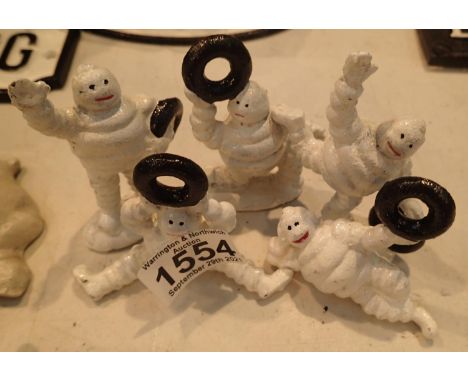 Six cast iron Michelin Men figurines, H: 8 cm. P&amp;P Group 1 (£14+VAT for the first lot and £1+VAT for subsequent lots) 