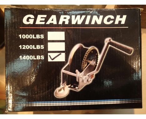 New old stock boxed manual hand winch, supported to 1400lbs. P&amp;P Group 2 (£18+VAT for the first lot and £3+VAT for subseq