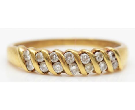 an 18ct gold brilliant cut diamond dress ring, stamped DO.25, N, 2.1gm. 