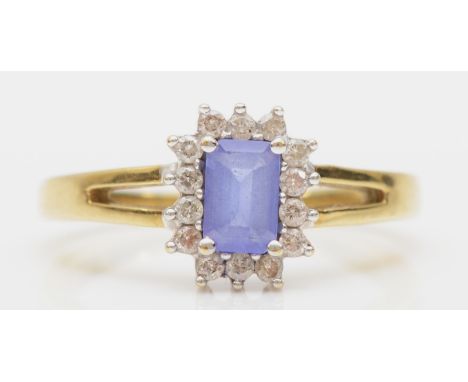 A 9ct gold, tanzanite and brilliant cut diamond cluster ring, N, 3.2gm 