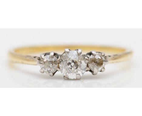 An unmarked gold three stone old cut diamond ring, O, 1.9gm. 