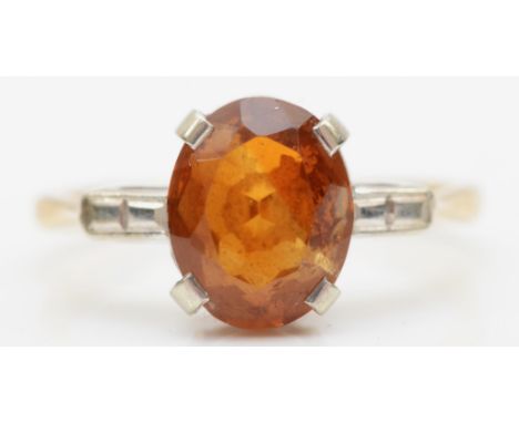 A 9ct gold citrine cocktail ring, M, 2.3gm. 