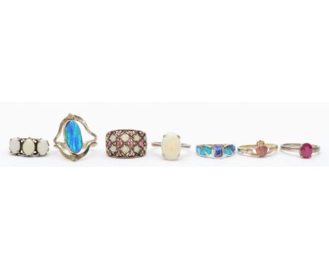 Six silver set opal rings, L - R, 22gm 