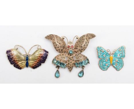 A silver, marcasite and coloured glass butterfly brooch, 64mm and two silver and enamel butterfly brooches, 47gm 