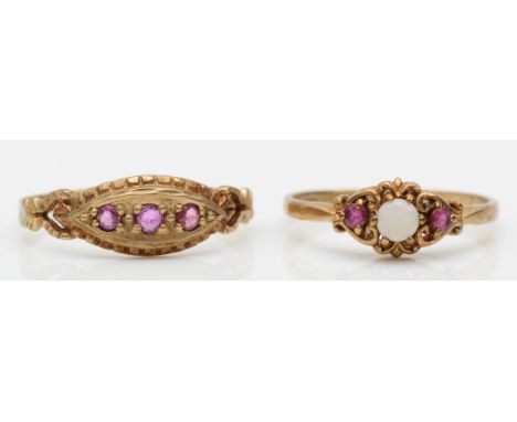 A 9ct gold opal and ruby ring, M, and an Edwardian style three stone ruby ring, Q, 2.7gm 