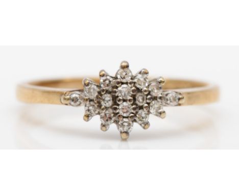 A 9ct gold and diamond cluster ring, M, 1.8gm 