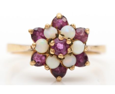 A 9ct gold ruby and opal floral cluster ring, O, 2.5gm. 