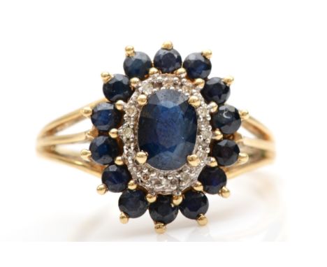 A 9ct gold sapphire and diamond cluster ring, R, 3.6gm 