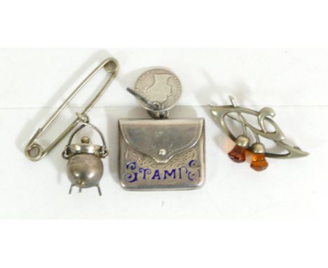 Charles Horner, a silver Art Nouveau brooch, an Edwardian silver and enamel stamp envelope, Birmingham 1903 and an Irish Conn