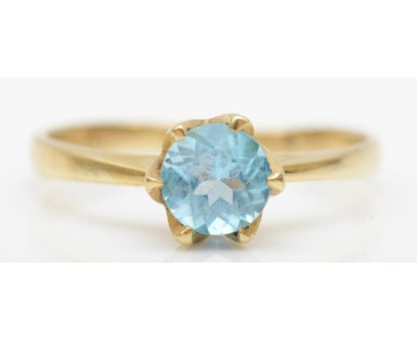 A 9ct gold single stone blue topaz ring, R, 2.1gm. 