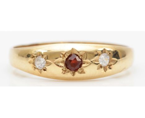 A 9ct gold three stone garnet and cubic zirconia dress ring, P, 1.6gm 