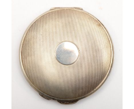 A silver compact, Birmingham 1960, with engine turned decoration, 8cm, 88gm