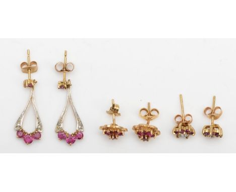 Two pairs of 9ct gold, ruby and diamond ear rings and a ruby pair, 4.2gm 