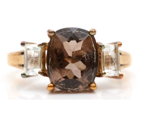 A 9k gold three stone smokey quartz and white topaz dress ring, M, 2.7gm. 